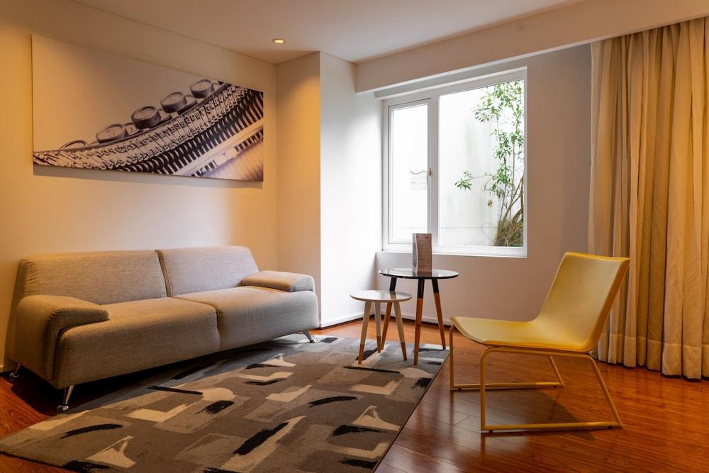 Quo Quality Hotel Manizales Exteriér fotografie A living room in a hotel